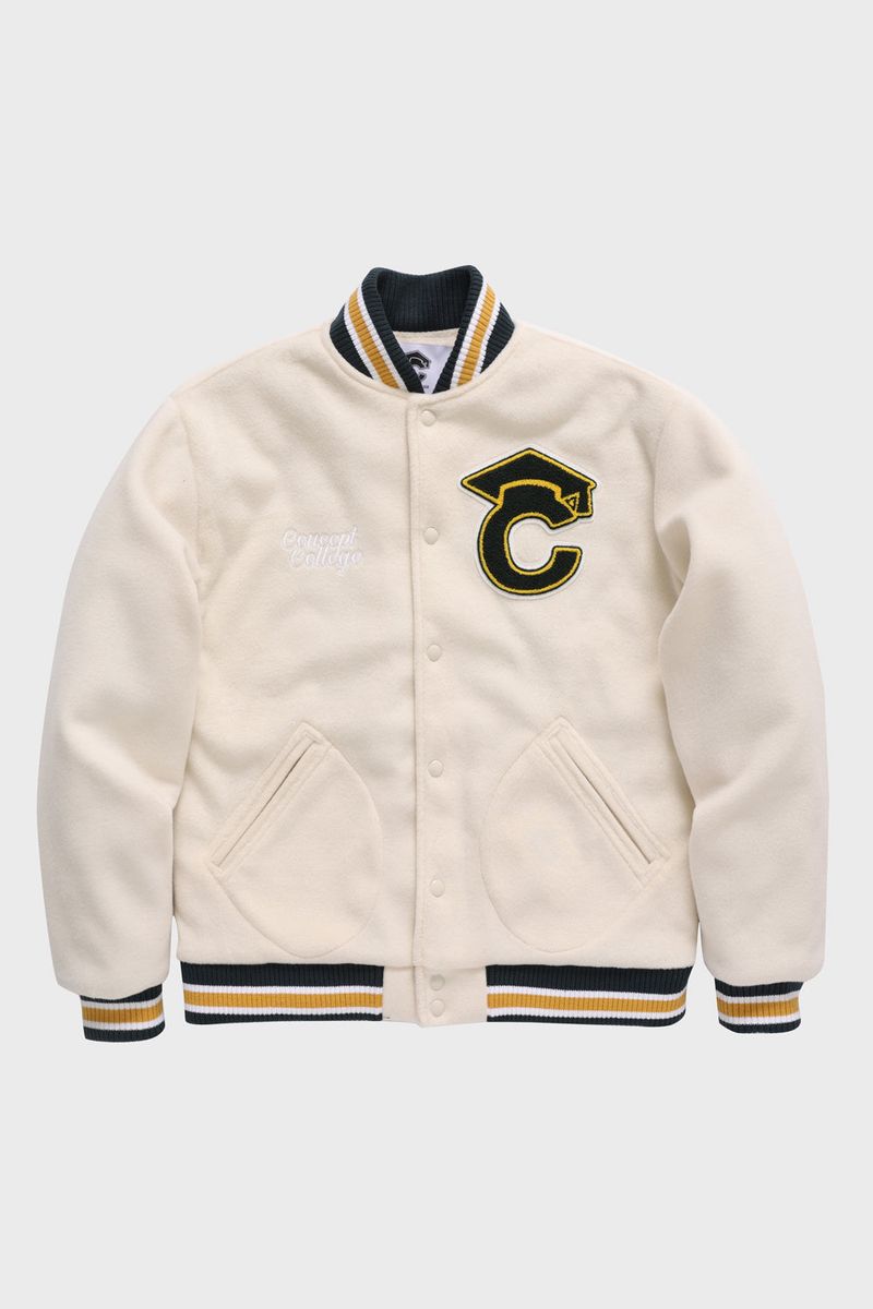 All Ivory graduation cap patch Unisex Varsity Jacket