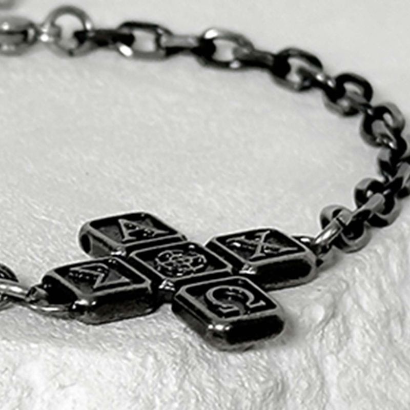 BLESSED BULLET（ブレスドブレット）の「ss-Riversivle symbol cross bracelet_black（Accessories）」