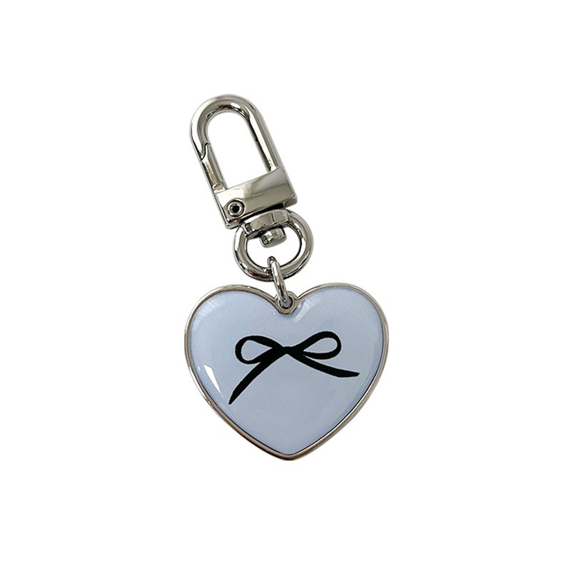 allthesamestudio(オールザセイムスタジオ)の「ribbon heart epoxy keyring(lavender blue)(Smartphone Accessories)」