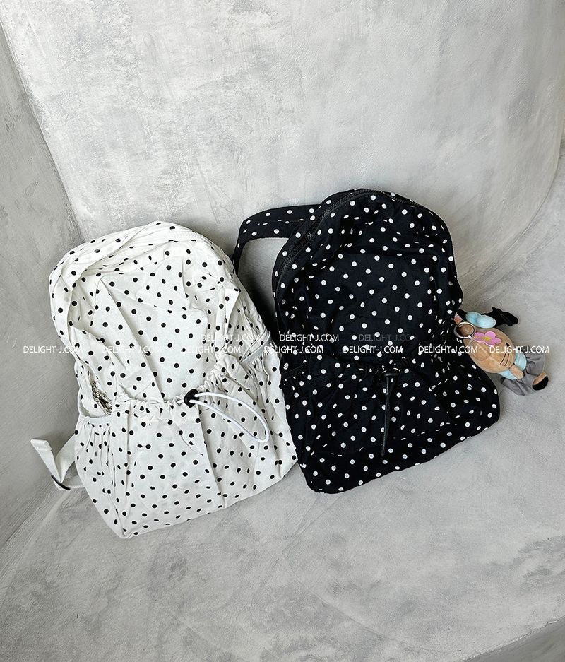 Dot dot string pocket backpack