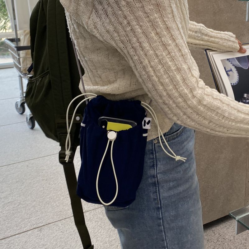 minmin（ミンミン）の「3 Pockets Mini Bag (Navy)（Bags）」