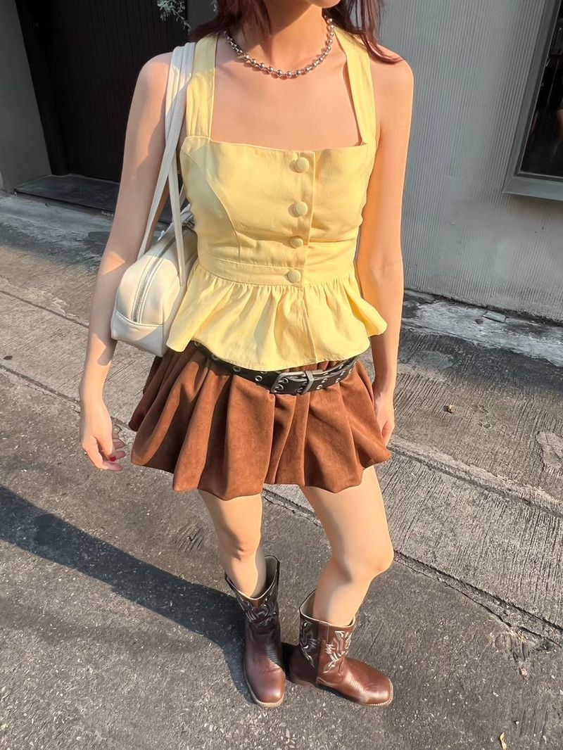 EVIE APPAREL（エヴィーアパレル）の「EVIE ヘイリークロスバックトップ イエロー（トップス）」