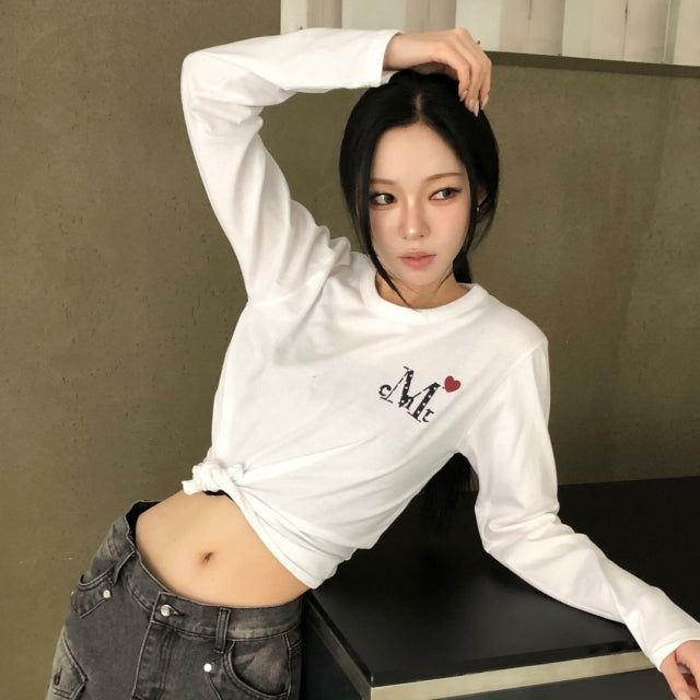 MUCENT（ムセント）の「ラブリッツ ミニ ハート ロゴ ロングスリーブ T(2Color)（トップス）」