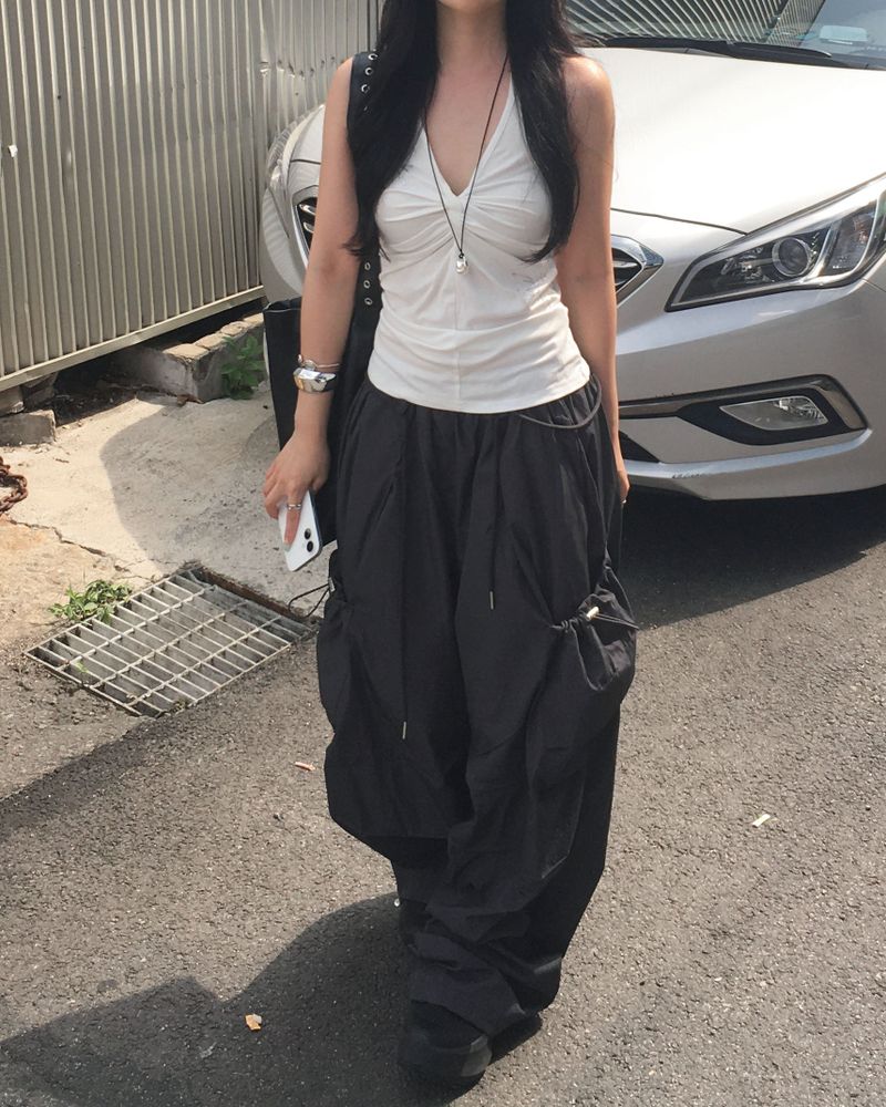 Cubic twisted sleeveless