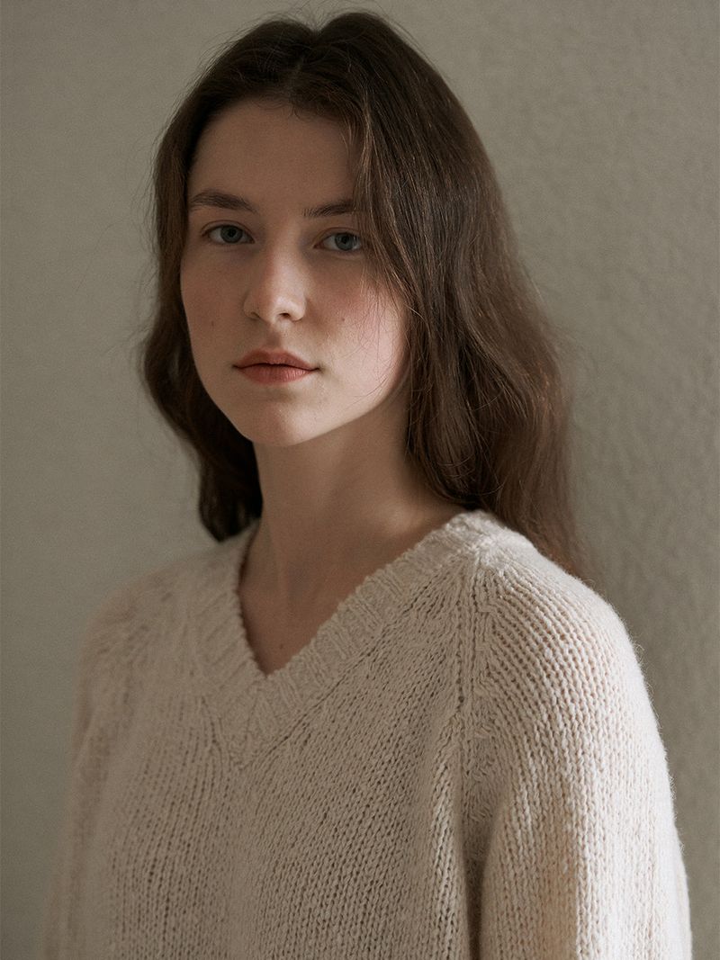 URAGO（ユラゴ）の「Rough reglen v-knit（Tops）」