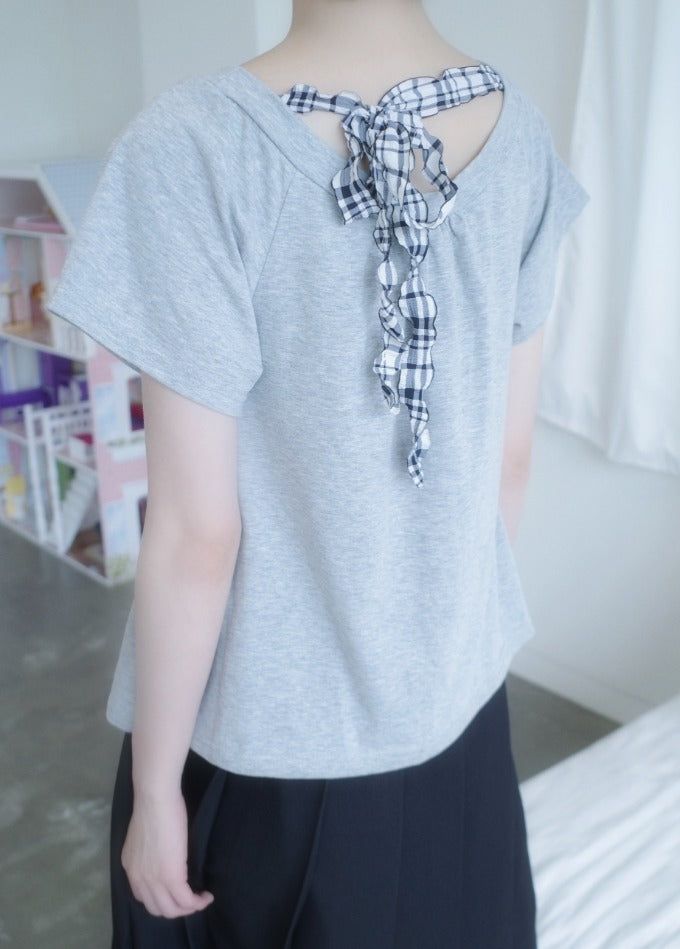 myorang（ミョラン）の「ピナッツチェックリボンTシャツ（Tops）」