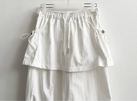 Log banding layered pocket skirt pants