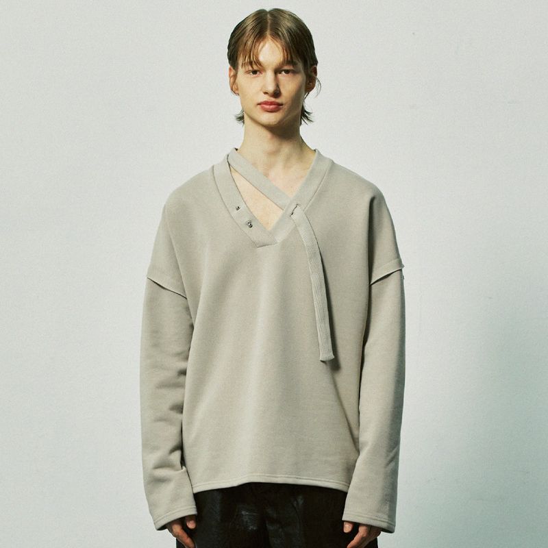S SY（エスエスワイ）の「v-neck layerd string pierced mtm mocha（Tops）」