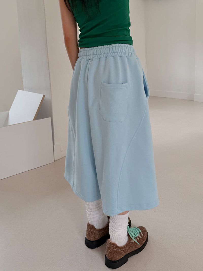 curved bermuda pants