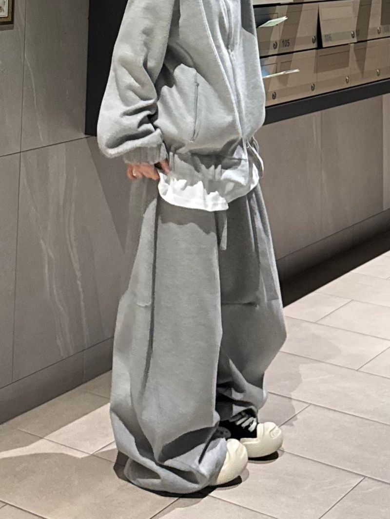 curved high-neck blouson zip-up