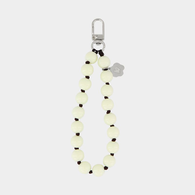 kenopi（ケノピ）の「サンシャイン ファームハウス ビーズ ハンドストラップ (Ivory)（ファッション小物）」
