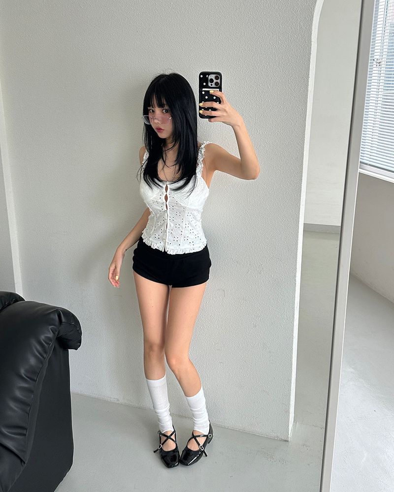 a punching eyelet bustier blouse