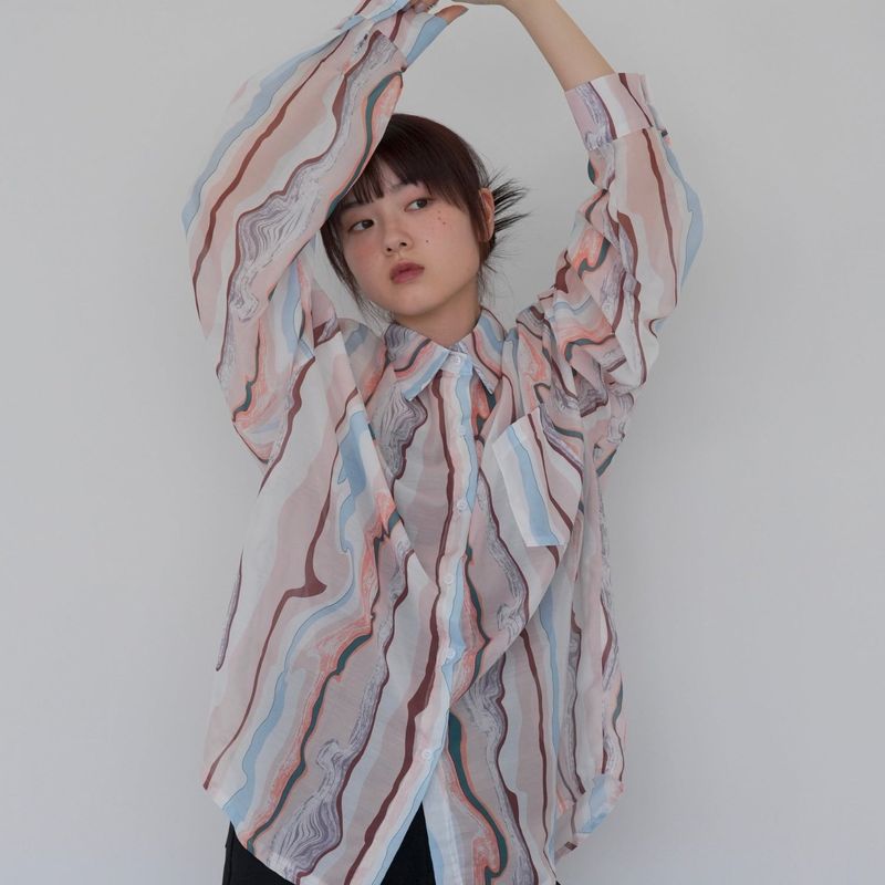 Uenui（ウニュイ）の「pastel marble sheer shirt（Tops）」