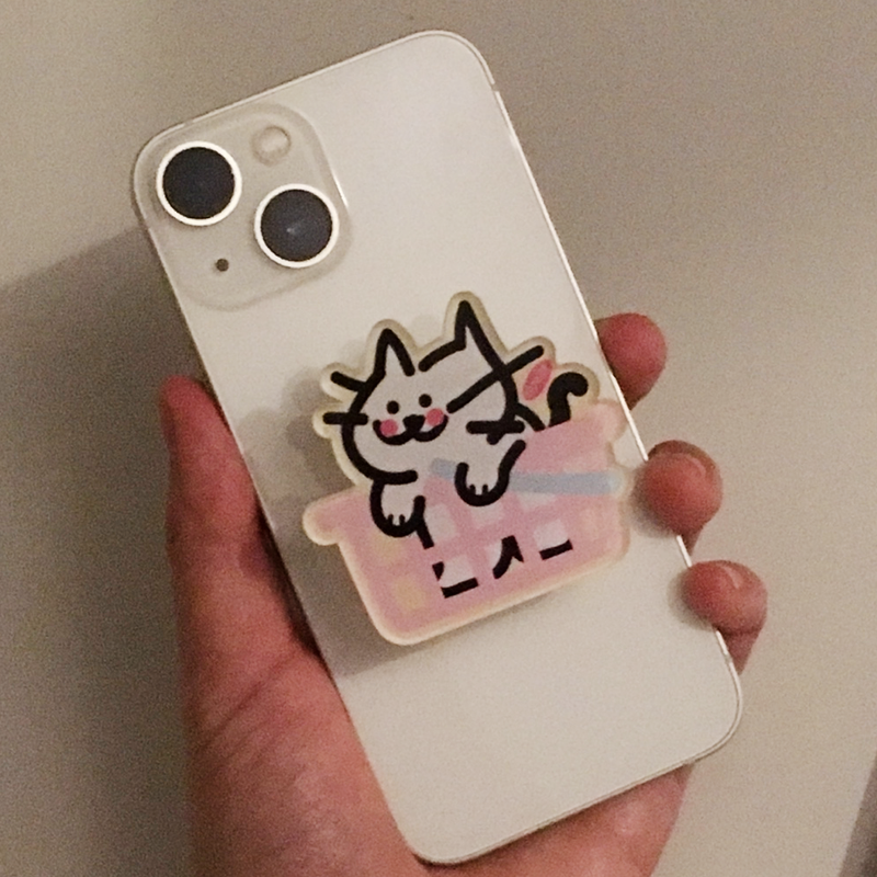 murmursroom（マーマーズルーム）の「バスケットキャットスマホグリップ (ベーシックスマホグリップ)（スマホグッズ/小物）」