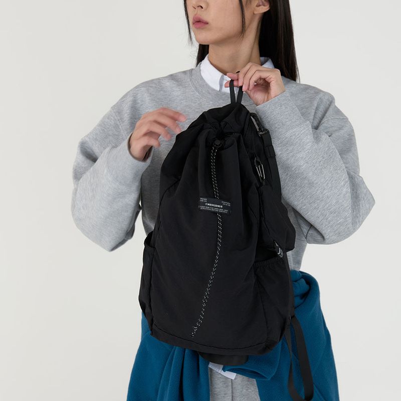 NEIKIDNIS（ネイキドニス）の「IDパッカブルストリングバックパック 18L / Black（バッグ）」
