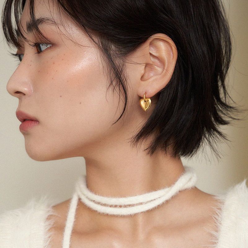 geegee(ジジ)の「dangle heart earring - gold(Accessories)」