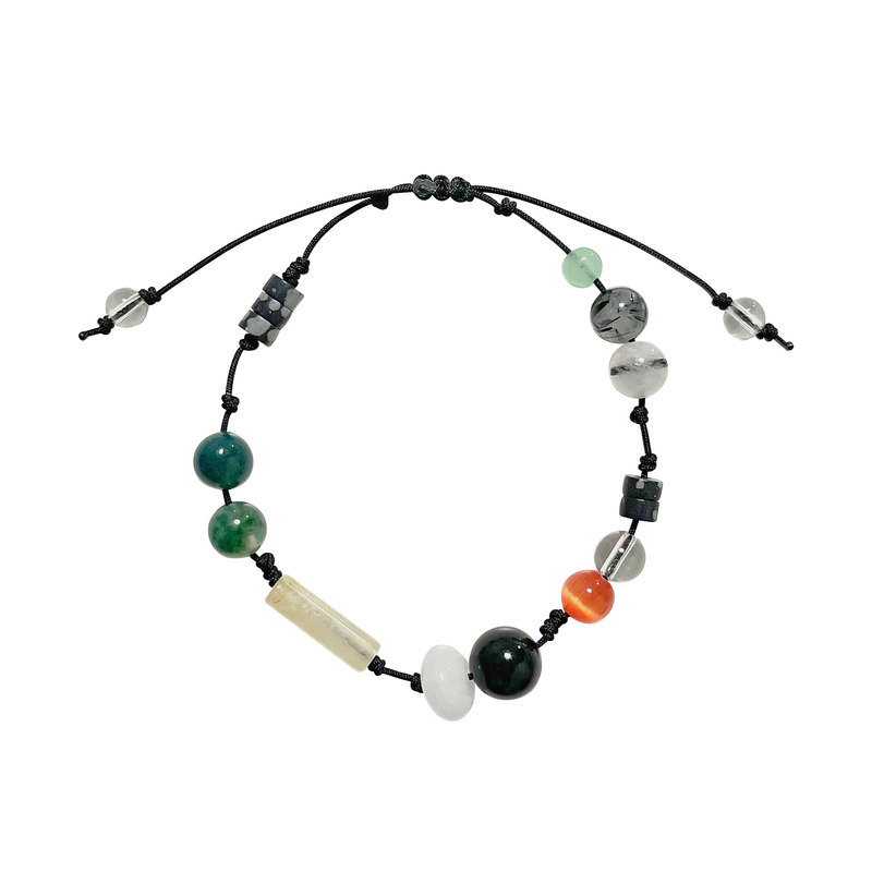 mOzi（モジ）の「A fish in a water plant gemstone bracelet（Accessories）」