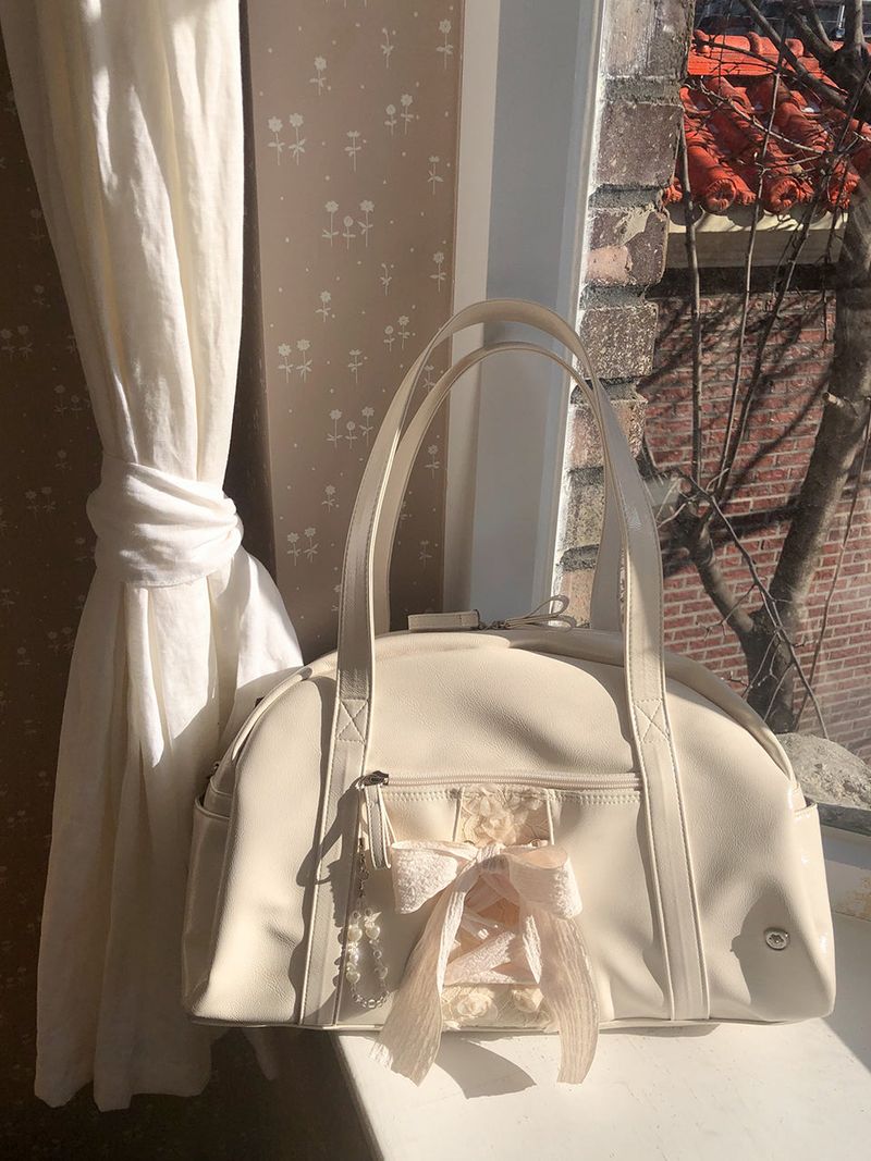 ovuni（オーブニ）の「Daily ribbon gym bag_cream（Bags）」