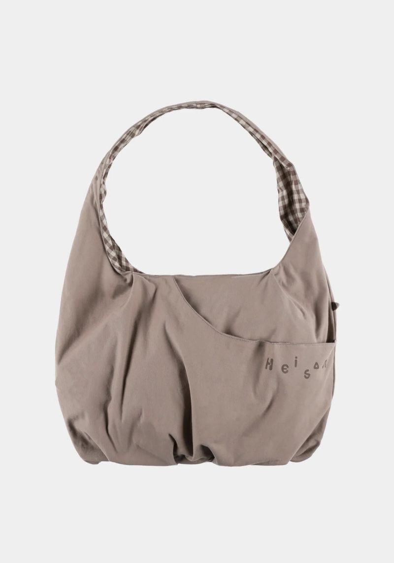 Heisan（ハイサン）の「チェックパッカブルパンプキンバッグ サンド（バッグ）」