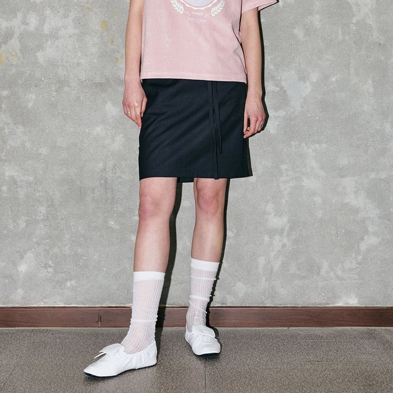 CORCA（コルカ）の「Stripe String Skirt Navy（Skirts）」