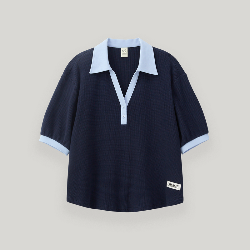 UBEIGE(ユーベイジ)の「Navy Half Open Collar Tee()」