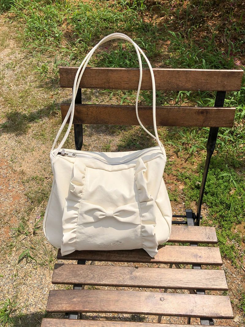 ovuni（オーブニ）の「Classic ruffle bag_cream（Bags）」