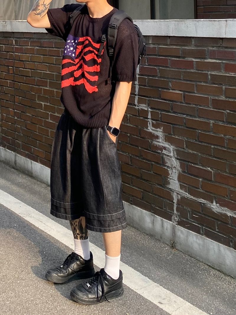 UNAIDUN（アネイダン）の「USA Round short sleeve knit 3（Tops）」