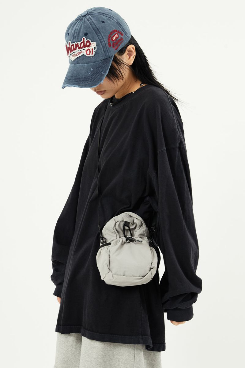 Raucohouse（ラウコハウス）の「Carabiner out pocket mini cross bag（Bags）」