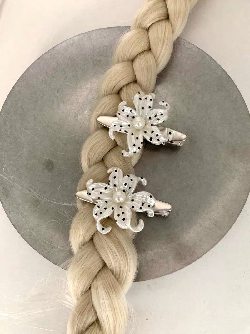 House of haus（ハウス オブ ハウス）の「Mini star dot flower hair-pin(1pcs)（Hair Accessories）」