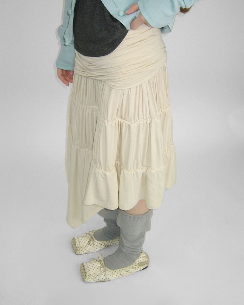 KHAN DRAPE SHIRRING UNBALANCED SKIRT
