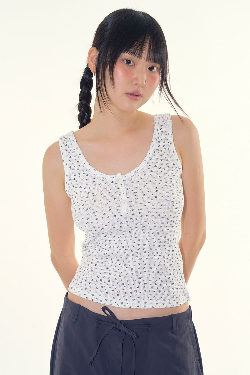 Raucohouse（ラウコハウス）の「Flower waffle henley sleeveless（Tops）」