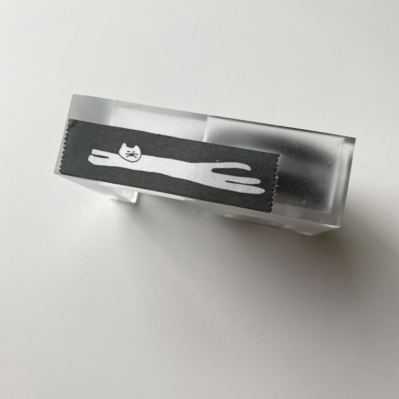 Stretched cat masking tape