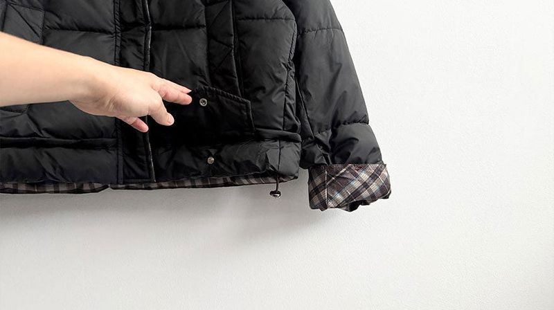 Pomi checkered lining padded jumper
