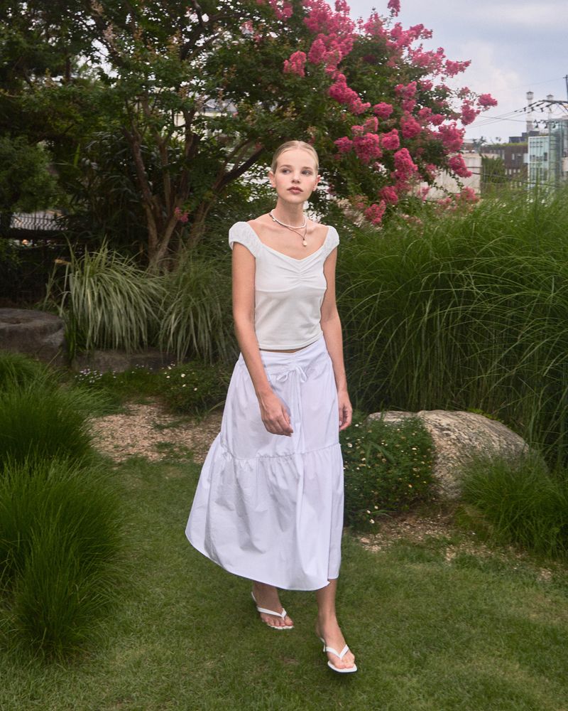 Yuheelee（ユヒリ）の「COTTON SHIRRING TIERED SKIRT / WHITE（Skirts）」