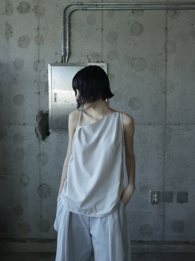 mnem（ムネム）の「Asib Unbalance Sleeveless Blouse（Tops）」