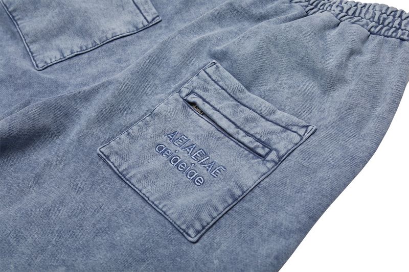 SYMBOL LOGO JOGGER PANTS [DENIM]