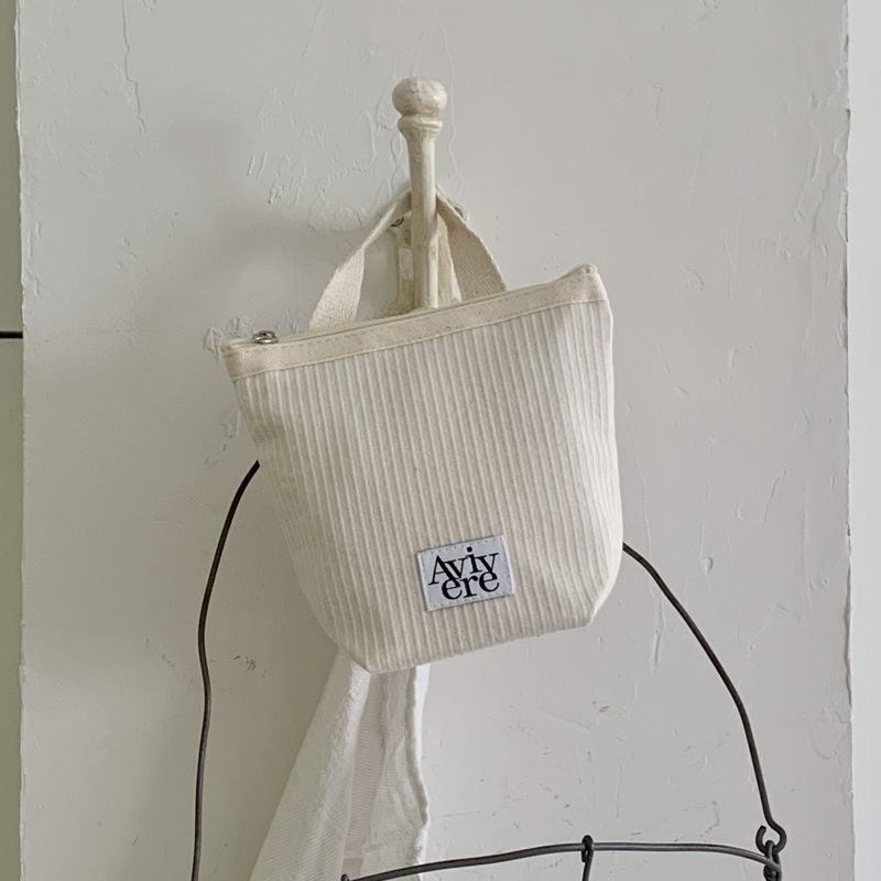 Avivere(アビベール)の「classic pouch_stripe handle ivory(Miscellaneous Goods/Stationery)」