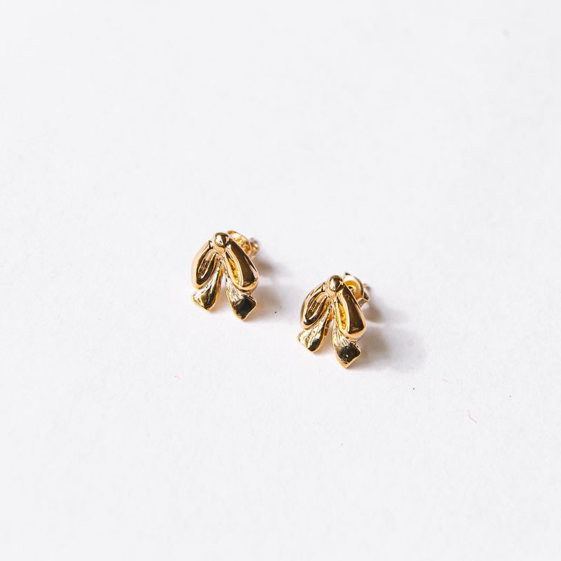 TOMAR（トマル）の「[MADE] タイニーリボンピアス (14k gold plated)（アクセサリー）」