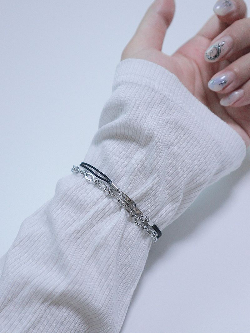 All surgical seel new wave layered string bracele
