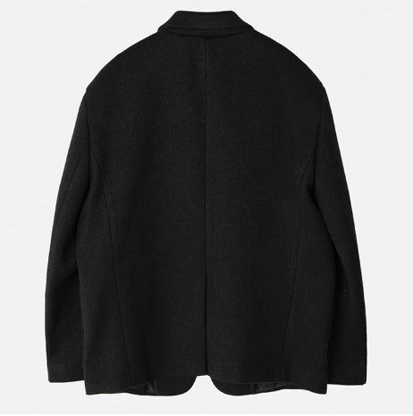 Crying medal over blazer