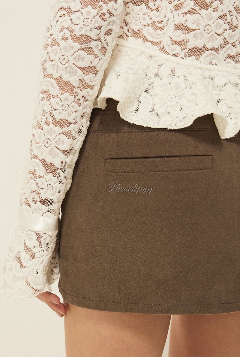 Buckle mini skirt