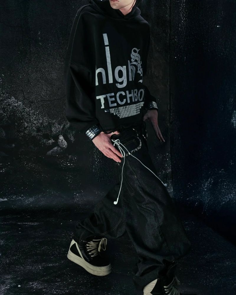 Cozy Worldwide(コージー ワールドワイド)の「"TECH B0Y" STUDDED HOODIE(Tops)」