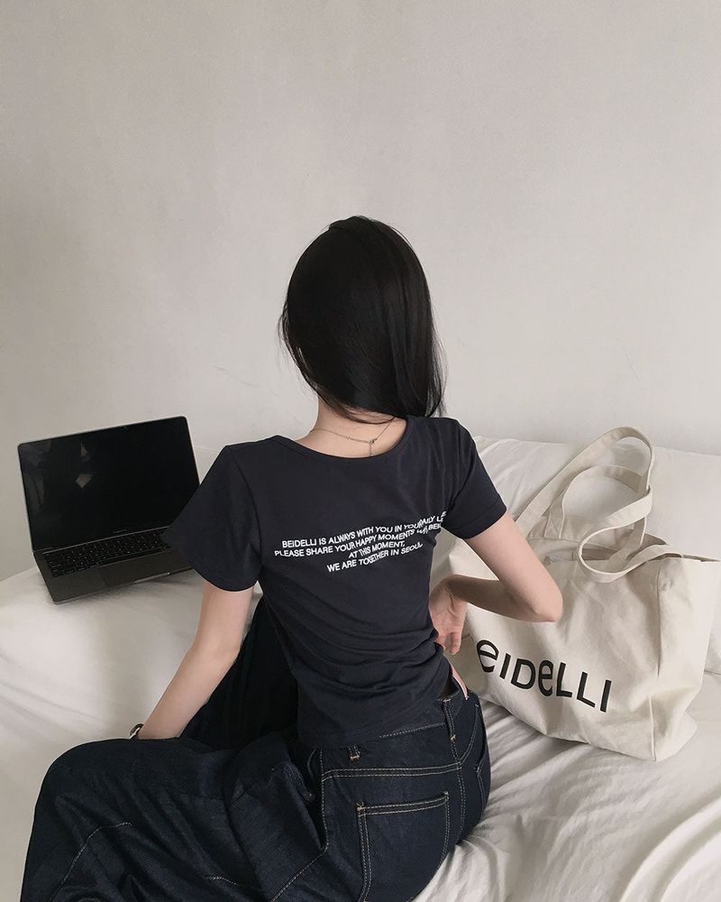 BEIDELLI（ベイデリー）の「"ONLY" lettering U-neck short-sleeved T-shirt（Tops）」