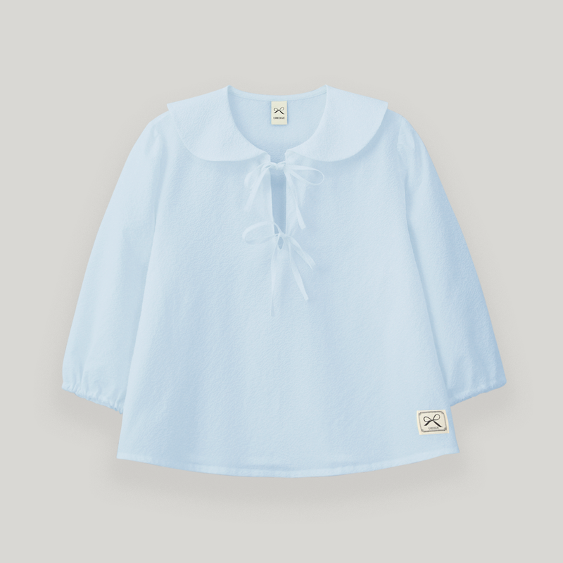 UBEIGE(ユーベイジ)の「Sky Blue Seersucker Ribbon Blouse(Tops)」