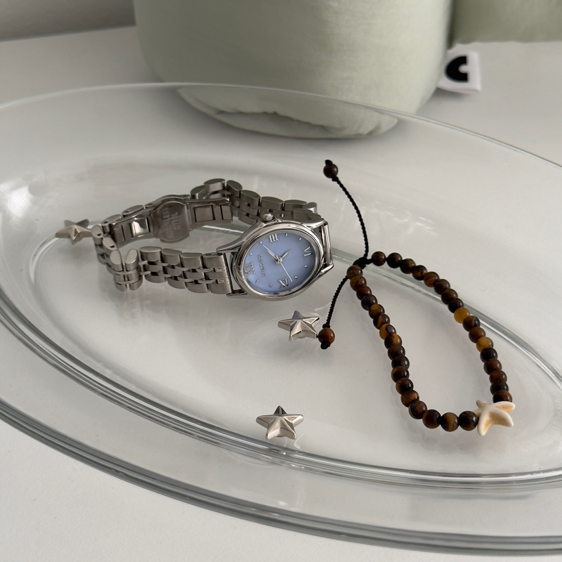 portraitseoul（ポートレイソウル）の「オーバルメタルウォッチ (blue)（アクセサリー）」