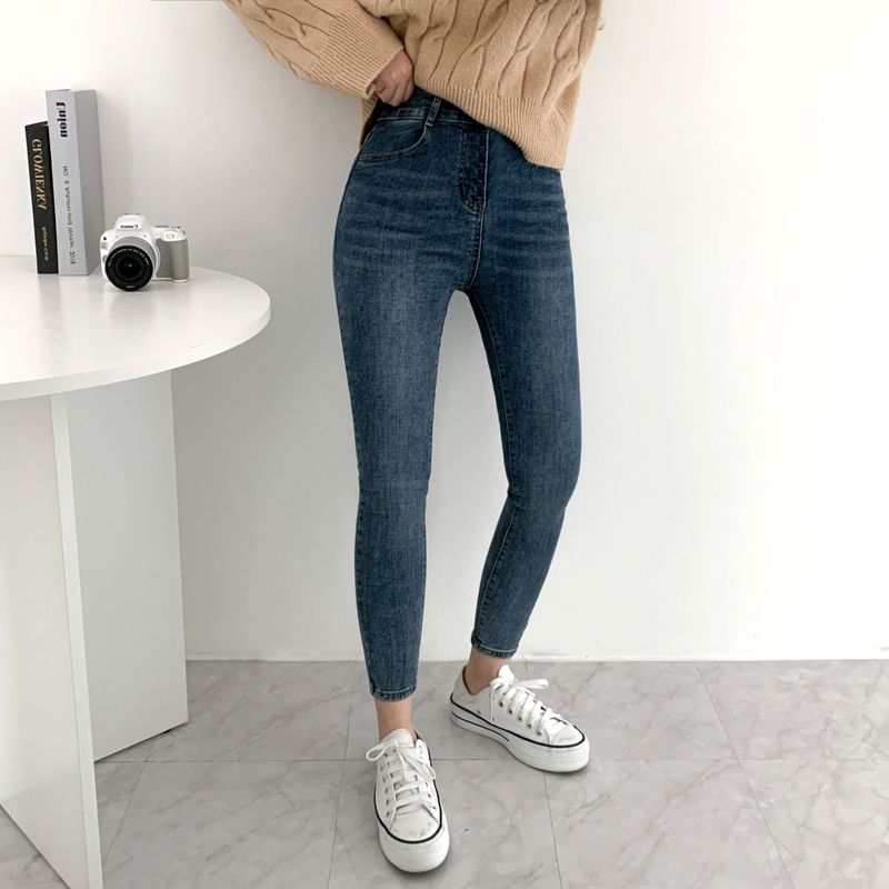 Whiskered Two-Button High Waist Skinny Jeans
