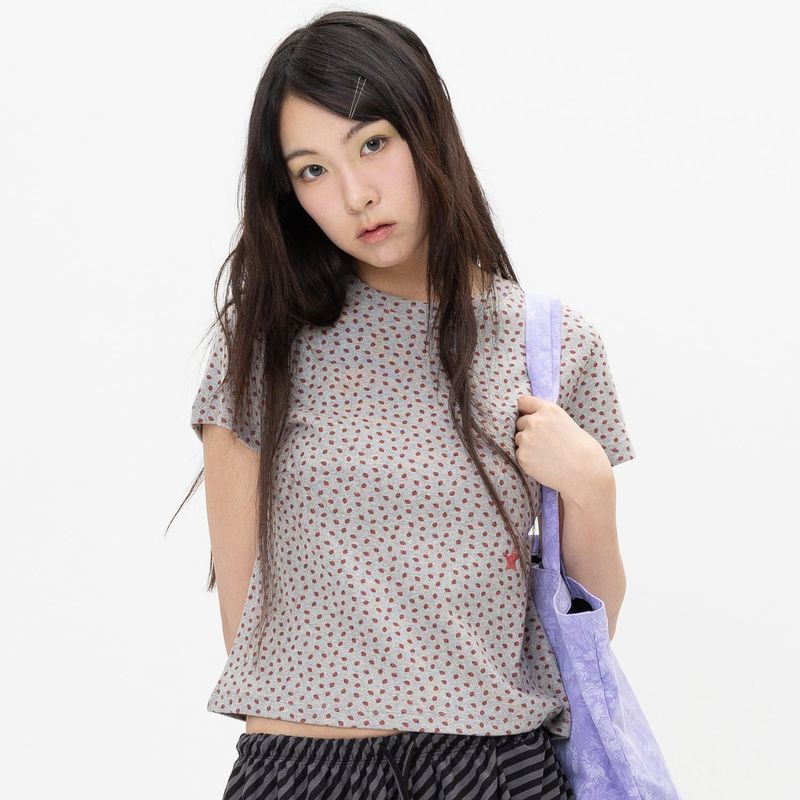 WEBHOUSE（ウェブハウス）の「Twister Star Angel Tee - Strawberry Grey（Tops）」