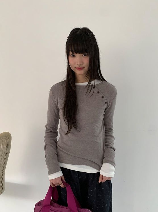 BAON（バオン）の「カニットダイアゴナルボタンラウンド長袖Tシャツ（トップス）」