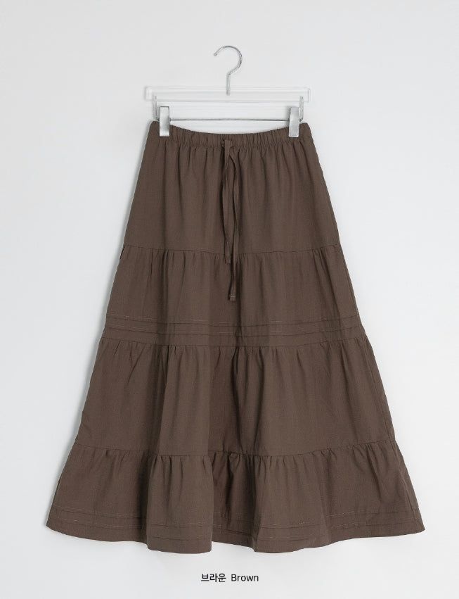 Nayuta Pintuck Tiered Banding Long Skirt