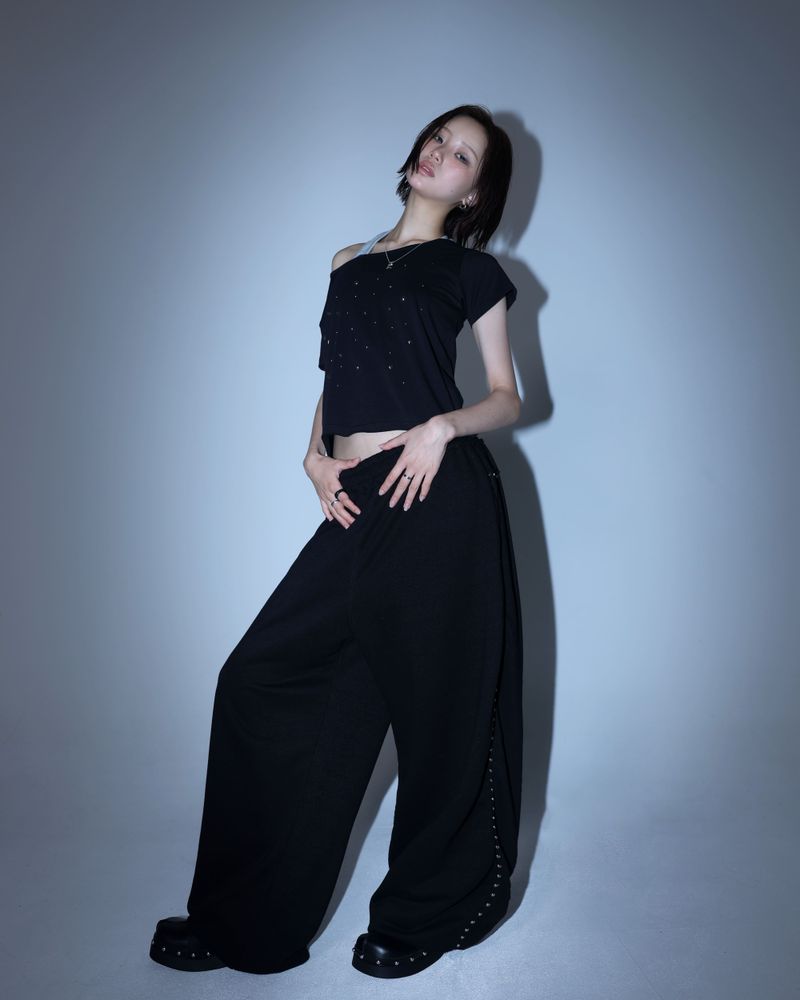aldiyouu(アルディユー)の「Line stud string sweatpants - Black(Pants)」